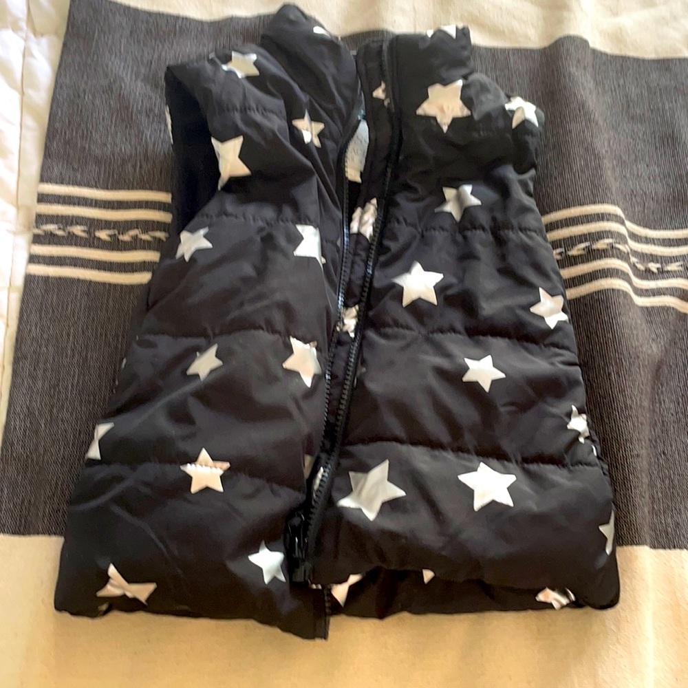Black vest with silver stars